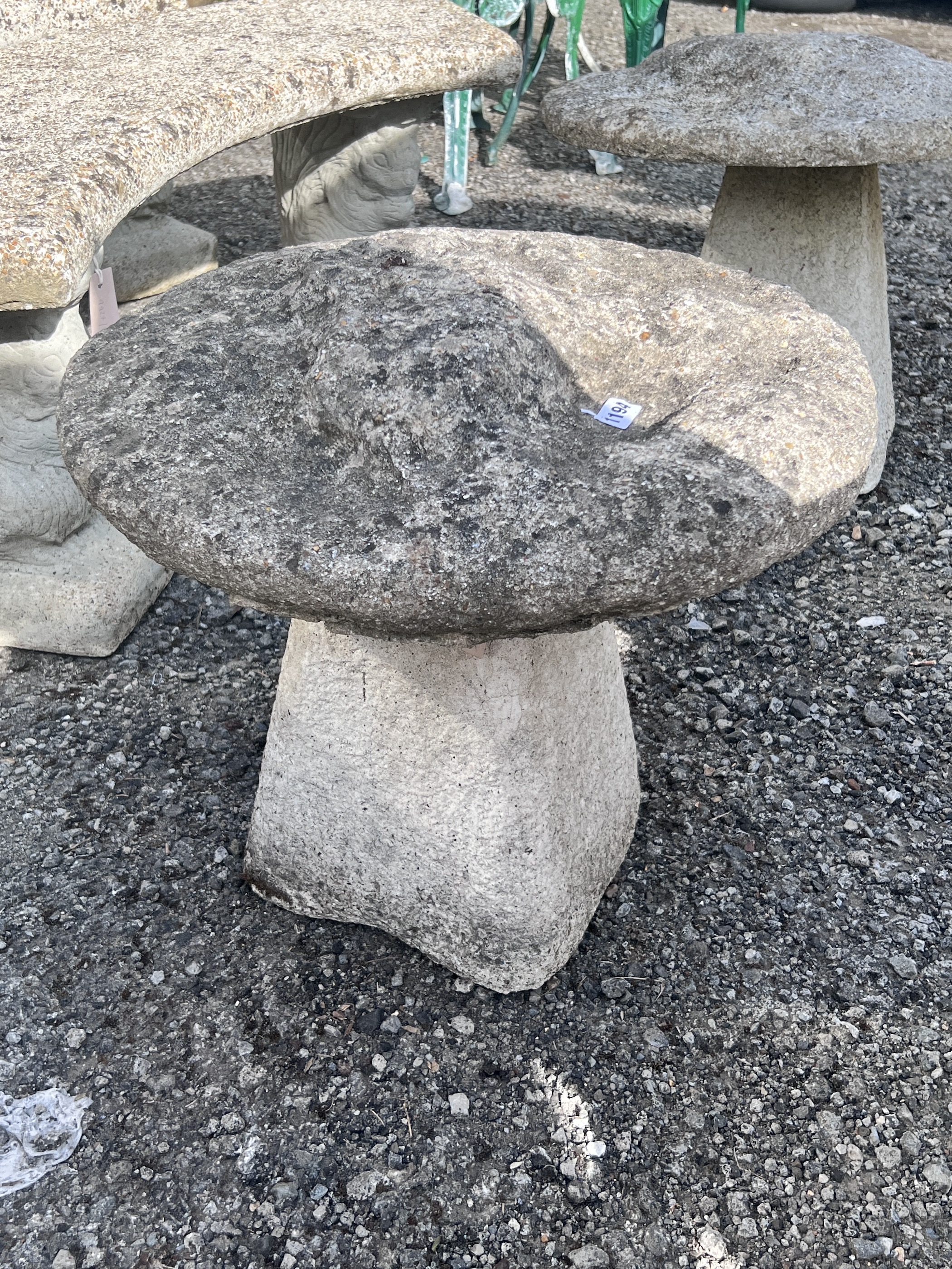 A pair of small reconstituted staddle stones, diameter 53cm, height 44cm